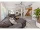 Spacious living room with stairs, open floor plan, and ample seating at 616 Gardenia Dr, Venice, FL 34285