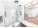 Bathroom featuring a glass shower door, mosaic tile accent wall, and a granite-topped vanity at 633 White Pine Tree Rd # 27, Venice, FL 34285