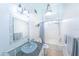Bathroom featuring a glass bowl sink atop a granite counter and a shower/tub combination at 633 White Pine Tree Rd # 27, Venice, FL 34285