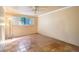 Bright bedroom with natural light, white trim, tile flooring and ceiling fan at 6724 Schooner Bay Cir # 6724, Sarasota, FL 34231