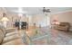Spacious living and dining area with tile flooring, large windows, and an open layout perfect for entertaining at 6724 Schooner Bay Cir # 6724, Sarasota, FL 34231