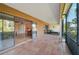 Expansive screened patio offering serene views of the canal and lush landscaping at 6724 Schooner Bay Cir # 6724, Sarasota, FL 34231