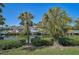 Scenic waterfront view showcasing the home's private dock and serene canal setting at 6724 Schooner Bay Cir # 6724, Sarasota, FL 34231