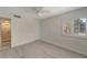 Light and bright bedroom with luxury vinyl plank flooring and ensuite bathroom access at 700 Golden Beach Blvd # 115, Venice, FL 34285