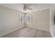 Cozy bedroom featuring plantation shutters and luxury vinyl plank flooring at 700 Golden Beach Blvd # 115, Venice, FL 34285