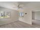 Bedroom with two windows offering natural light, updated flooring and neutral paint colors at 700 Golden Beach Blvd # 115, Venice, FL 34285
