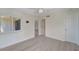 Bedroom features light walls and floors, a ceiling fan, and lots of natural light at 700 Golden Beach Blvd # 115, Venice, FL 34285