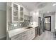 Updated kitchen featuring stone countertops, mosaic backsplash, and stainless steel appliances at 700 Golden Beach Blvd # 115, Venice, FL 34285