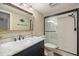 Updated bathroom with a marble countertop vanity and glass enclosed walk-in shower at 726 Bird Bay W Dr # 153, Venice, FL 34285