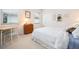 Well-lit bedroom with a large window and neutral decor at 744 Fringed Orchid Trl, Venice, FL 34293