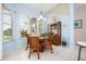 Cozy breakfast nook with large windows and a view of the water at 744 Fringed Orchid Trl, Venice, FL 34293