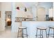 Inviting kitchen features a breakfast bar, connecting seamlessly to the surrounding spaces at 744 Fringed Orchid Trl, Venice, FL 34293