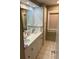 Bathroom featuring double vanity and tile flooring at 795 Cervina N Dr, Venice, FL 34285