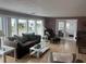 Comfortable living room featuring windows and neutral color scheme at 795 Cervina N Dr, Venice, FL 34285