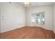 This bedroom boasts wood floors, a ceiling fan, a window nook and lots of natural light at 799 Harrington Lake N Dr # 73, Venice, FL 34293