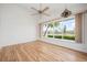 Bright living room featuring a large window with a view of the lake at 799 Harrington Lake N Dr # 73, Venice, FL 34293