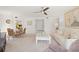 Open-concept living and dining area with ample natural light and stylish decor creating a welcoming space at 810 Capri Isles Blvd # 230, Venice, FL 34292