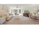Open-concept living and dining area offers ample space and natural light with comfortable seating at 810 Capri Isles Blvd # 230, Venice, FL 34292