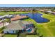 Charming home with a screened-in pool overlooking a tranquil pond in a beautiful golf community at 854 Blue Crane Dr, Venice, FL 34285