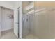 Modern bathroom showcases a glass-enclosed shower with tiled walls at 854 Blue Crane Dr, Venice, FL 34285