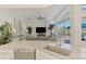 Open kitchen featuring granite countertops, stainless steel appliances, and an eat-in dining area with outdoor views at 854 Blue Crane Dr, Venice, FL 34285