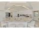 Bright kitchen with an island, granite countertops, stainless steel appliances, and a breakfast bar with seating at 854 Blue Crane Dr, Venice, FL 34285