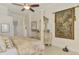 Tastefully decorated main bedroom with a four-poster bed and ensuite bathroom at 854 Blue Crane Dr, Venice, FL 34285