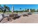 Inviting outdoor seating area with tables and chairs overlooking the golf course at Pelican Pointe Golf and Country Club at 854 Blue Crane Dr, Venice, FL 34285