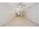 Spacious living room showcasing the bright, airy layout and open kitchen at 930 Capri Isles Blvd # 120, Venice, FL 34292