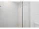 Modern walk-in shower featuring tiled walls and glass doors at 930 Capri Isles Blvd # 120, Venice, FL 34292
