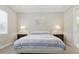 This bedroom features a neutral color palette and soft, inviting natural light at 10136 Coral Shore Dr, Englewood, FL 34223