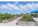 The community garden features raised garden beds, producing fresh vegetables and fruits at 10136 Coral Shore Dr, Englewood, FL 34223