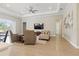 Relaxing living room with light colored walls and plenty of natural light at 10136 Coral Shore Dr, Englewood, FL 34223