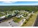 Beautiful view of a suburban neighborhood with waterfront homes, and lush greenery at 106 Playmore Dr, Venice, FL 34293