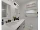 Bathroom features double sinks, stylish mirrors, and modern fixtures at 106 Playmore Dr, Venice, FL 34293