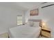 Bright bedroom featuring desert-themed decor, and modern furnishings at 106 Playmore Dr, Venice, FL 34293
