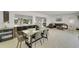 Spacious open floor plan showcases a modern kitchen, dining area, and comfortable living room at 106 Playmore Dr, Venice, FL 34293