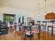 A bright lounge area with seating, workspace, and beverage station is great for gathering and relaxing at 11343 Bertolini Dr, Venice, FL 34292