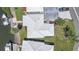 Aerial view of the property showing the boat dock, landscaping, and private drive at 120 Villa Dr # 120, Osprey, FL 34229