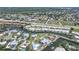 Community aerial view showcasing waterfront homes situated along winding canals and boat docks at 120 Villa Dr # 120, Osprey, FL 34229