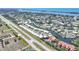 Lovely aerial view of waterfront homes and canals with convenient access to the open water at 120 Villa Dr # 120, Osprey, FL 34229