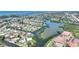 Scenic aerial view featuring a waterfront community with canals and lush landscaping at 120 Villa Dr # 120, Osprey, FL 34229