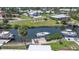 Aerial view features a canal with boat dock at 120 Villa Dr # 120, Osprey, FL 34229