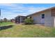 Cozy screened patio area with a relaxing outdoor space and well-manicured lawn at 120 Villa Dr # 120, Osprey, FL 34229