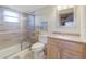 Bathroom featuring a walk-in shower, modern vanity, and tile flooring at 120 Villa Dr # 120, Osprey, FL 34229