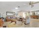 Spacious living room features tile floors, comfortable seating, and stone accent wall at 120 Villa Dr # 120, Osprey, FL 34229