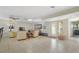 Bright and airy living room with tile floors, comfortable seating and access to the outdoors at 120 Villa Dr # 120, Osprey, FL 34229
