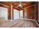 Bedroom featuring wood ceiling, walls and floors along with a closet at 121 Dolly St, Punta Gorda, FL 33950