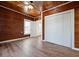 Bedroom featuring wood ceiling, walls and floors along with a closet at 121 Dolly St, Punta Gorda, FL 33950