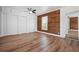 Upstairs features hardwood accent wall, storage, and modern flooring throughout at 121 Dolly St, Punta Gorda, FL 33950
